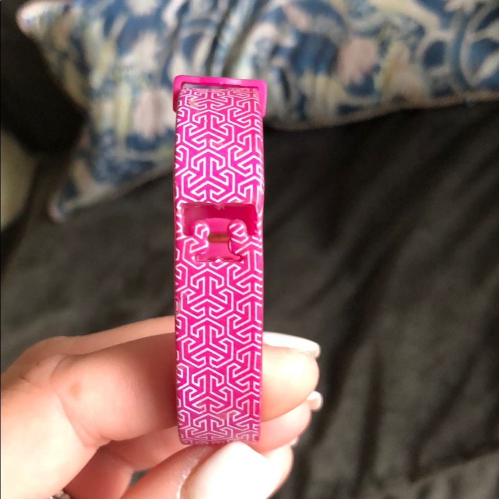 Hot Pink Tory Burch silicon bracelet.